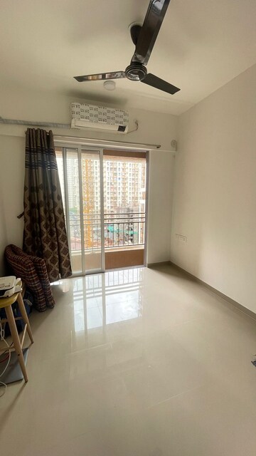 Living Room in 1 BHK Apartment at JP North Alexa, Mira Road – for Sale