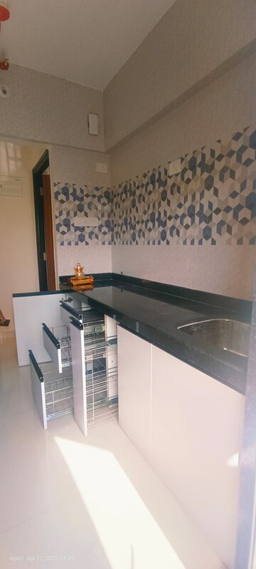 Kitchen in 1 BHK Apartment at Raunak Bliss, Ghodbunder Road – for Rent