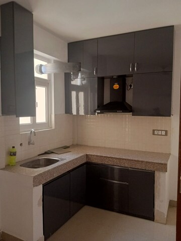 Kitchen in 1 BHK Apartment at ROF Amaltas, Sector 92 – for Rent