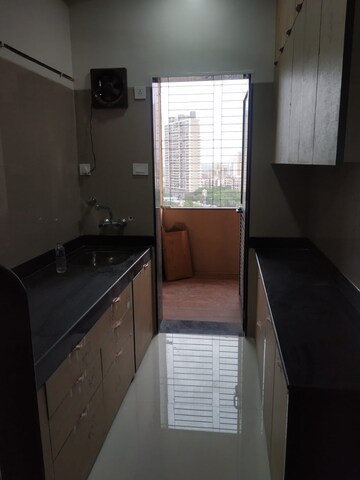 Kitchen in 1 BHK Apartment at K Raheja Raheja Residency, Malad East – for Sale