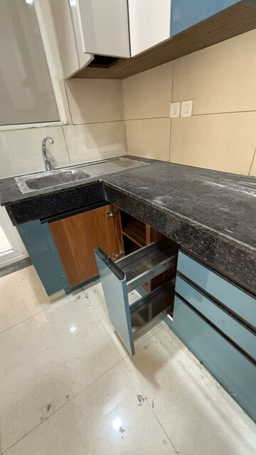 Kitchen in 2 BHK Apartment at Tata Eureka Park, Sector 150 – for Rent