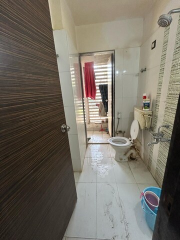 Bathroom in 2 BHK Apartment at Cosmos Jewels, Ghodbunder Road – for Rent