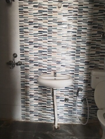 Bathroom in 2 BHK Apartment at Signature Global The Roselia, Sector 95a – for Rent