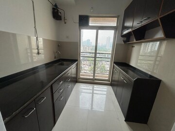 Kitchen in 2 BHK Apartment at Sudarshan Sky Garden, Ghodbunder Road – for Rent