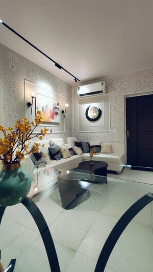 Living Room in 2.5 BHK Apartment at Charms Castle, Raj Nagar Extension – for Sale