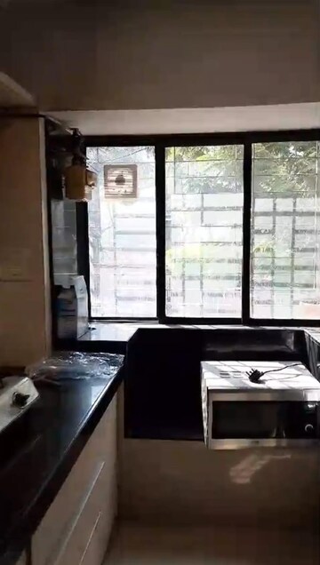 Kitchen in 2 BHK Apartment at Silver Sand CHS, Andheri West – for Rent