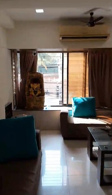 Living Room in 2 BHK Apartment at Silver Sand CHS, Andheri West – for Rent