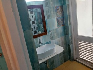 Bathroom in 3 BHK Apartment at Hiranandani Gardens Lake Castle, Powai – for Sale