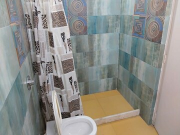 Bathroom in 3 BHK Apartment at Hiranandani Gardens Lake Castle, Powai – for Sale