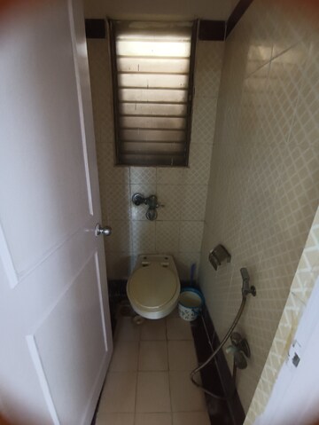 Bathroom in 1 BHK Apartment at RNA Regency Park, Kandivali West – for Rent