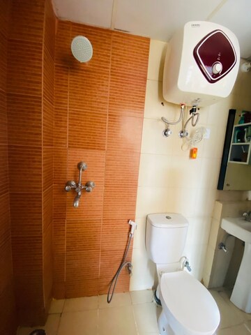 Bathroom in 3 BHK Apartment at Mahagun Mywoods, Sector 16c Greater Noida – for Rent