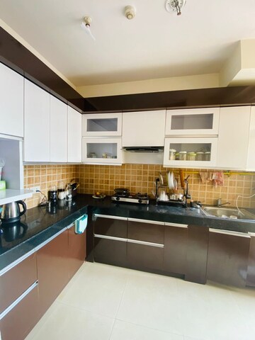 Kitchen in 3 BHK Apartment at Mahagun Mywoods, Sector 16c Greater Noida – for Rent