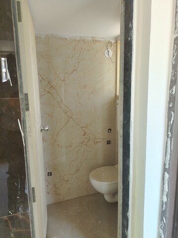 Bathroom in 1 BHK Apartment at MAAD Nakoda Heights, Nalasopara West – for Rent