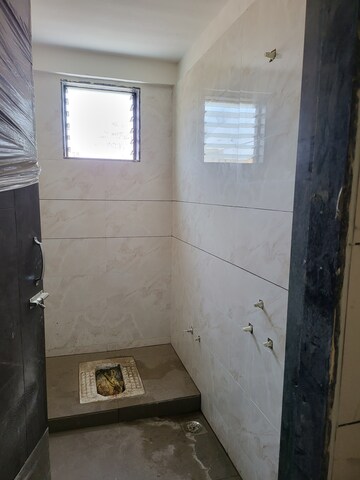 Bathroom in 2 BHK Apartment at Amli Ind Estate – for Sale
