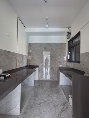 Kitchen in 3 BHK Apartment at Viceroy Savana, Kandivali East – for Sale