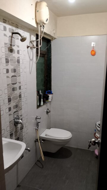 Bathroom in 3 BHK Apartment at Kamanwala Manavsthal, Malad West – for Rent