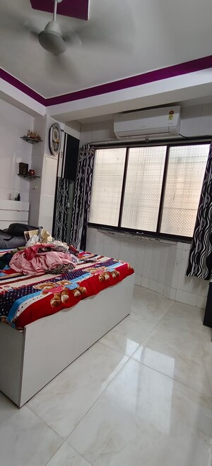 Bedroom in 3 BHK Apartment at Anandi CHS, Charkop Gaon – for Sale