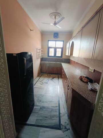 Kitchen in 2 BHK Apartment at Sunny Enclave – for Rent