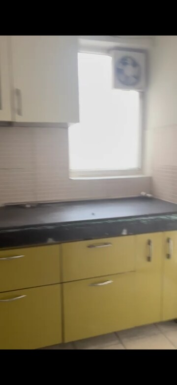 Kitchen in 2.5 BHK Apartment at Antriksh Golf View, Sector 78 – for Rent