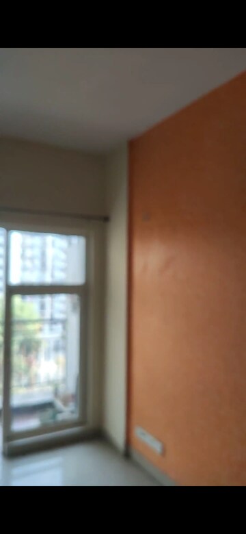 Living Room in 3 BHK Apartment at Aims Golf City, Sector 75 – for Rent