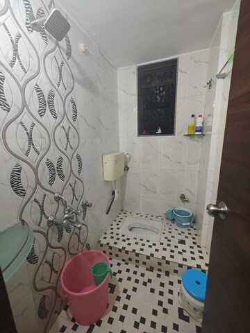 Bathroom in 1 BHK Apartment at VM Mohan Pride, Nerul – for Rent
