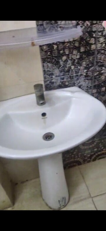 Bathroom in 2 BHK Apartment at Prateek Wisteria, Sector 77 – for Rent