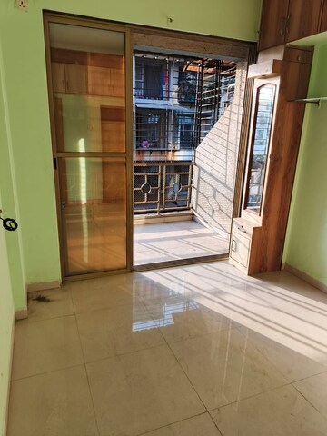 Room in 2 BHK Apartment at Mangeshi Flora, Kalyan West – for Rent