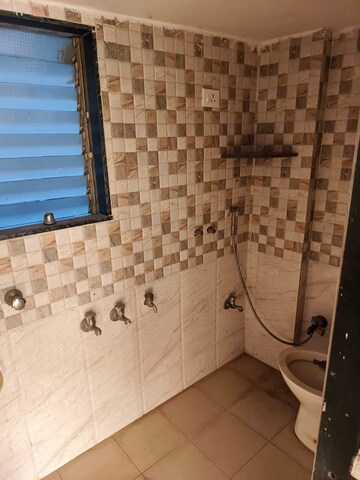 Bathroom in 2 BHK Apartment at Mangeshi Flora, Kalyan West – for Rent