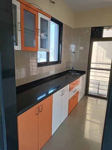 Kitchen in 3 BHK Apartment at Sangharsh CHS, Nerul Sector 25 – for Rent