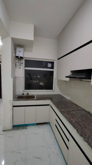 Kitchen in 2 BHK Apartment at Pivotal Paradise, Sector 62 – for Rent