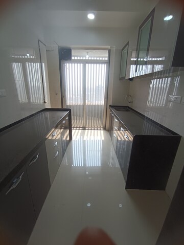 Kitchen in 2 BHK Apartment at Shreeji Atlantis, Malad West – for Rent
