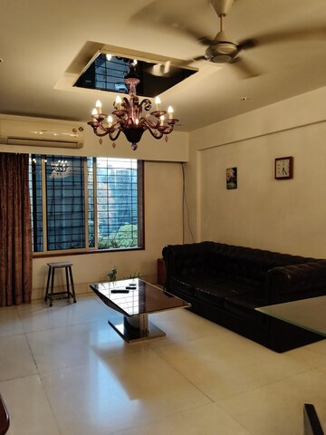 Living Room in 2 BHK Apartment at Golden Square, Santacruz East – for Rent