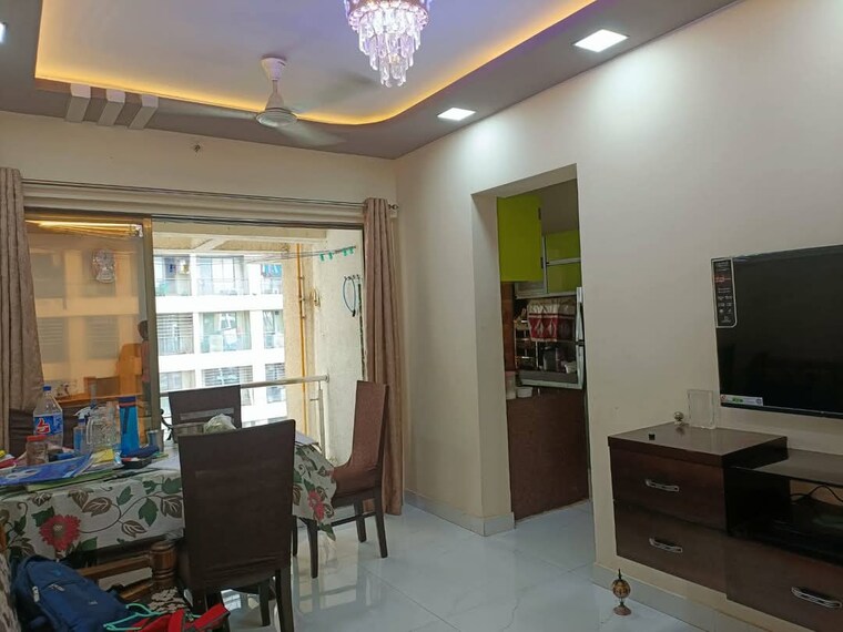 Living Room, shree-ostwal-orchid-building-no-9-to-12 2 Bedroom 995 Sq.Ft. Apartment In Mira Road Thane 8489509