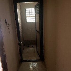 Building Lobby in 1 BHK Apartment at Jai Matadi Complex, Kalher – for Sale