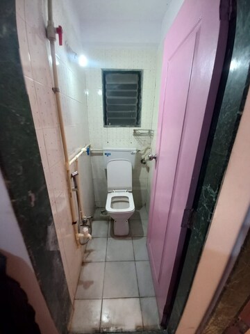 Bathroom in 1 BHK Apartment at Gokuldham Complex, Goregaon East – for Rent