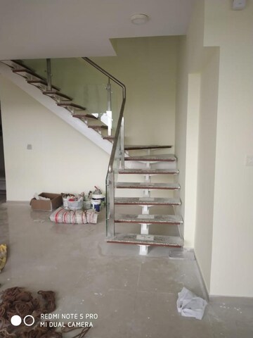 Staircase in 4 BHK Apartment at Tata Avenida, New Town – for Sale