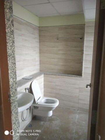 Bathroom in 4 BHK Apartment at Tata Avenida, New Town – for Sale
