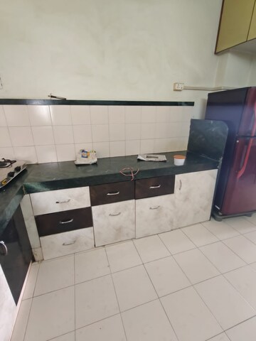 Kitchen in 2 BHK Apartment at HN Safal Samprat Residency, Satellite – for Rent