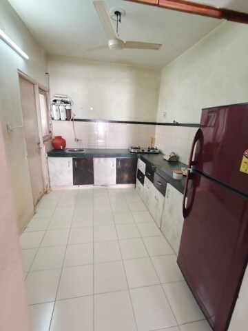 Kitchen in 2 BHK Apartment at HN Safal Samprat Residency, Satellite – for Rent