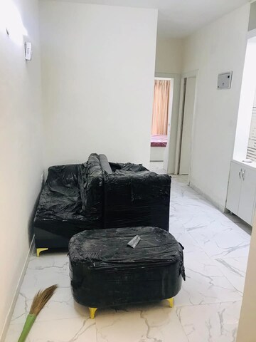 Living Room in 2 BHK Apartment at Pivotal 99 Marina Bay, Sector 99 – for Rent