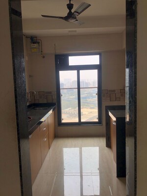 Kitchen in 3 BHK Apartment at Vasant Valley Ivy Tower, Malad East – for Sale