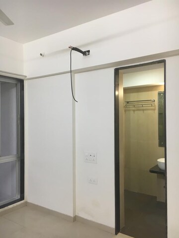 Building Lobby in 2 BHK Apartment at Divine Aspen Garden, Goregaon East – for Rent
