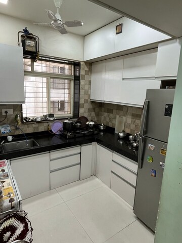 Kitchen in 2 BHK Builder Floor at Mittal Sun Aura, Sinhagad Road – for Sale