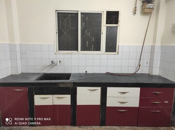 Kitchen in 2 BHK Apartment at Potnis Parisar, Karve Nagar – for Rent
