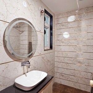 Bathroom in 4 BHK Builder Floor at Ansal API Esencia, Sector 67 – for Sale