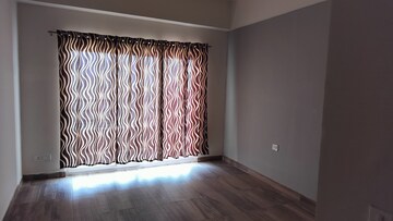Bedroom in 1 BHK Apartment at Paramount Golfforeste, Zeta I Greater Noida – for Rent