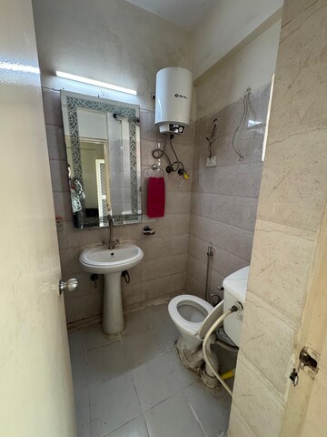 Bathroom in 2 BHK Apartment at Mahagun Mywoods II, Sector 16c Greater Noida – for Rent