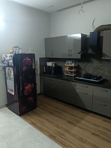 Kitchen in 3 BHK Builder Floor at Dhakoli Village – for Sale
