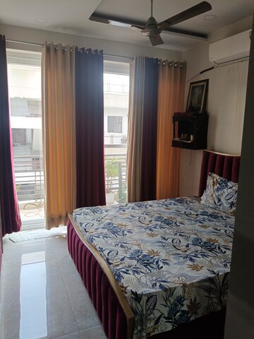 Bedroom in 3 BHK Builder Floor at Dhakoli Village – for Sale