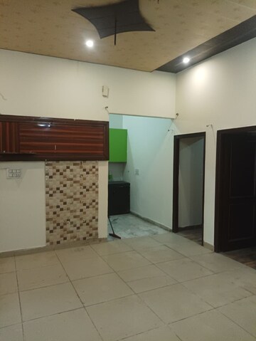 Bedroom in 3 BHK Builder Floor at Dhakoli Village – for Sale
